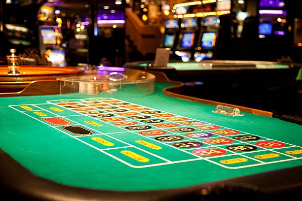 Mobile phone showing QRIS payment screen on exototo slot